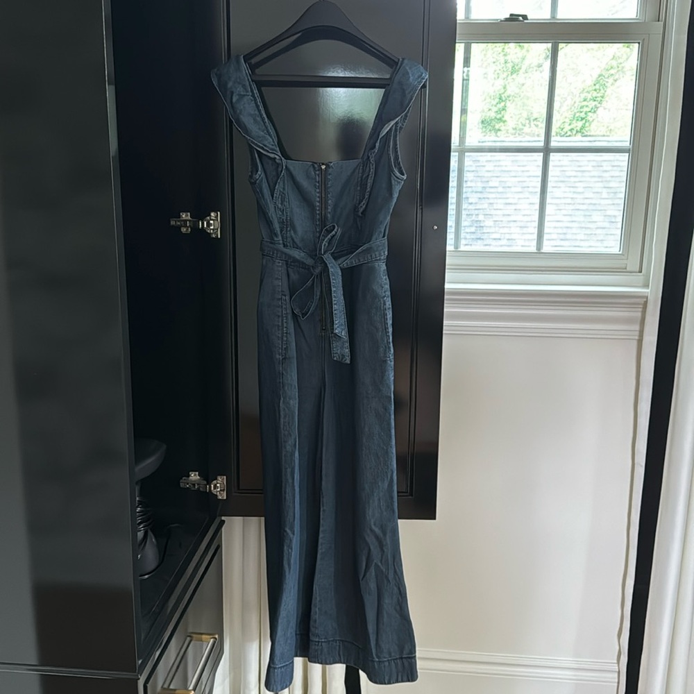 Free People Tied Denim Ruffle Jumpsuit.